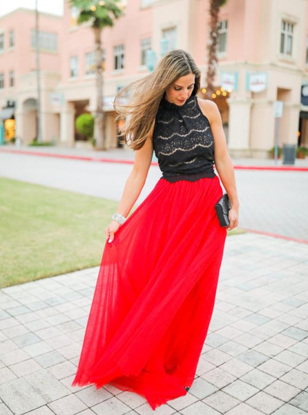 A beautiful  tall woman wearing a Red Gala tulle skirt