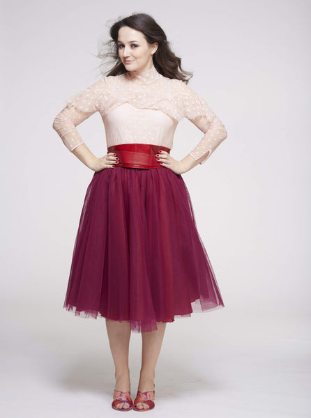 A woman wearing a Cherry Red Midi tulle skirt