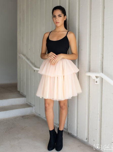 Model wearing the Carrie tulle skirt in Champagne