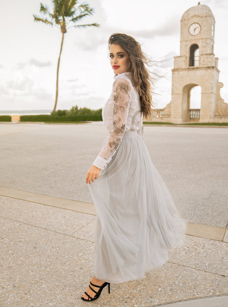 Woman wearing a Long Light Gray tulle skirt 