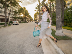 Woman wearing a Long Light Gray tulle skirt 