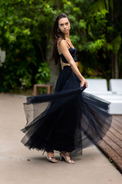 Fashion model wearing a black Gala tulle skirt