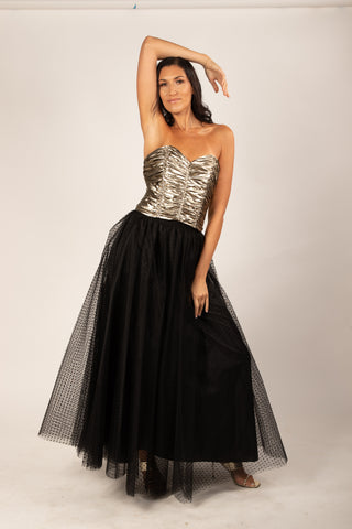 A beautiful  tall girl wearing a black dotted Gala tulle skirt