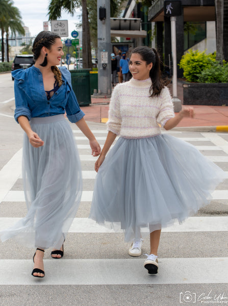 Two models wearing tulle skirts, one wearing the Long Light Gray and the other wearing the Midi Light Gray tutu