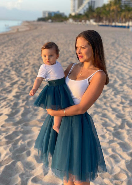 mom and daughter wearin matching tulle tutu skirts